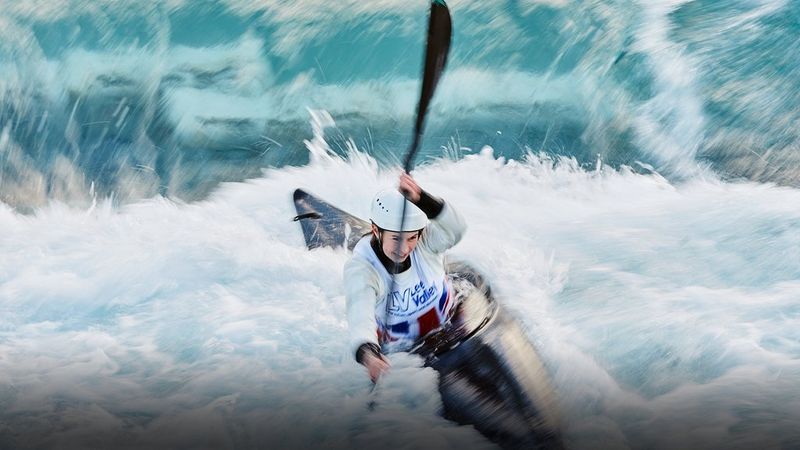 silhouette of surfer on wave